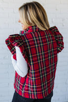Blonde Woman Wearing a Red Christmas Plaid Ruffled Puffer Vest.