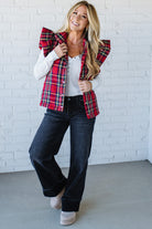 Blonde Woman Wearing a Red Christmas Plaid Ruffled Puffer Vest.