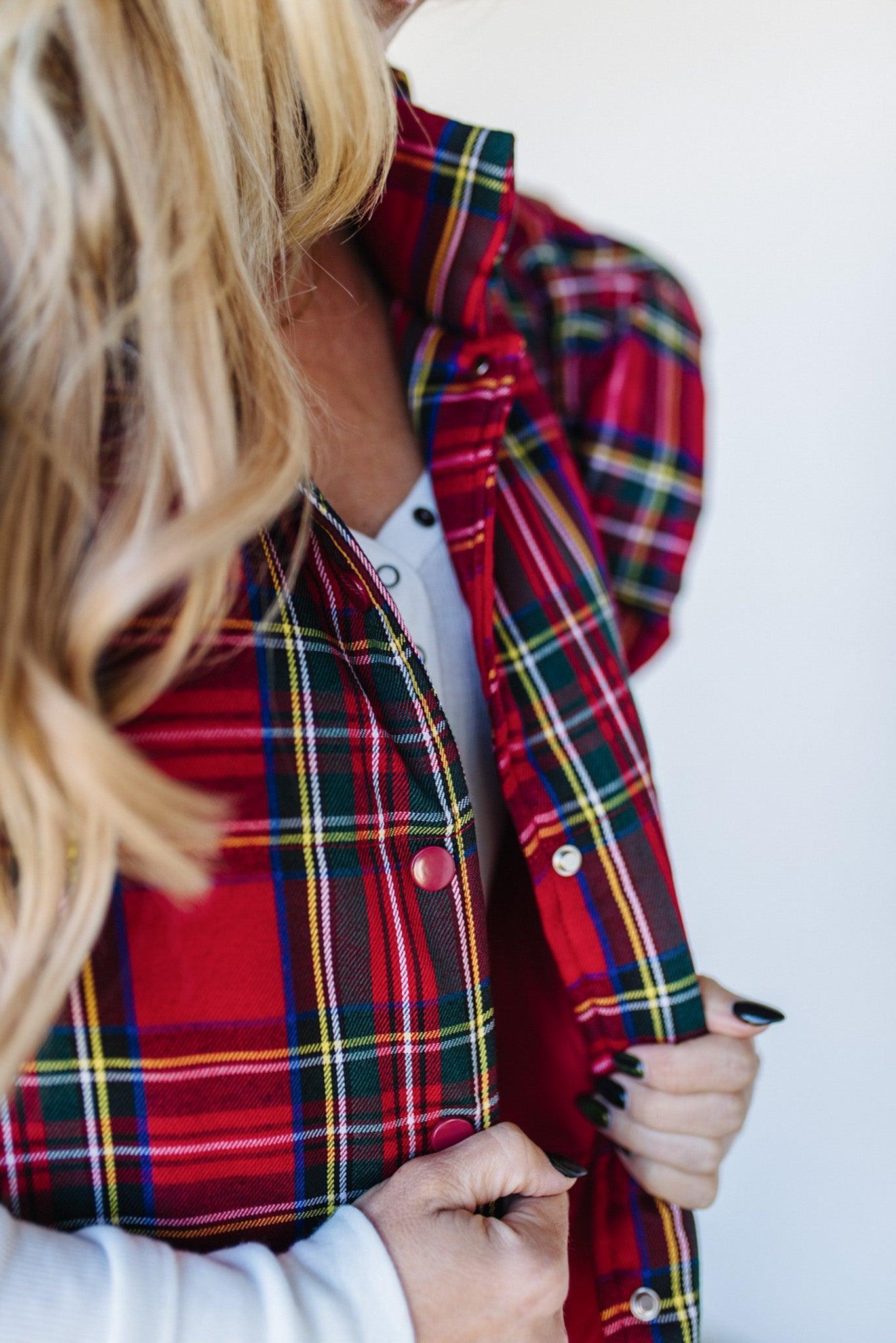 Blonde Woman Wearing a Red Christmas Plaid Ruffled Puffer Vest.