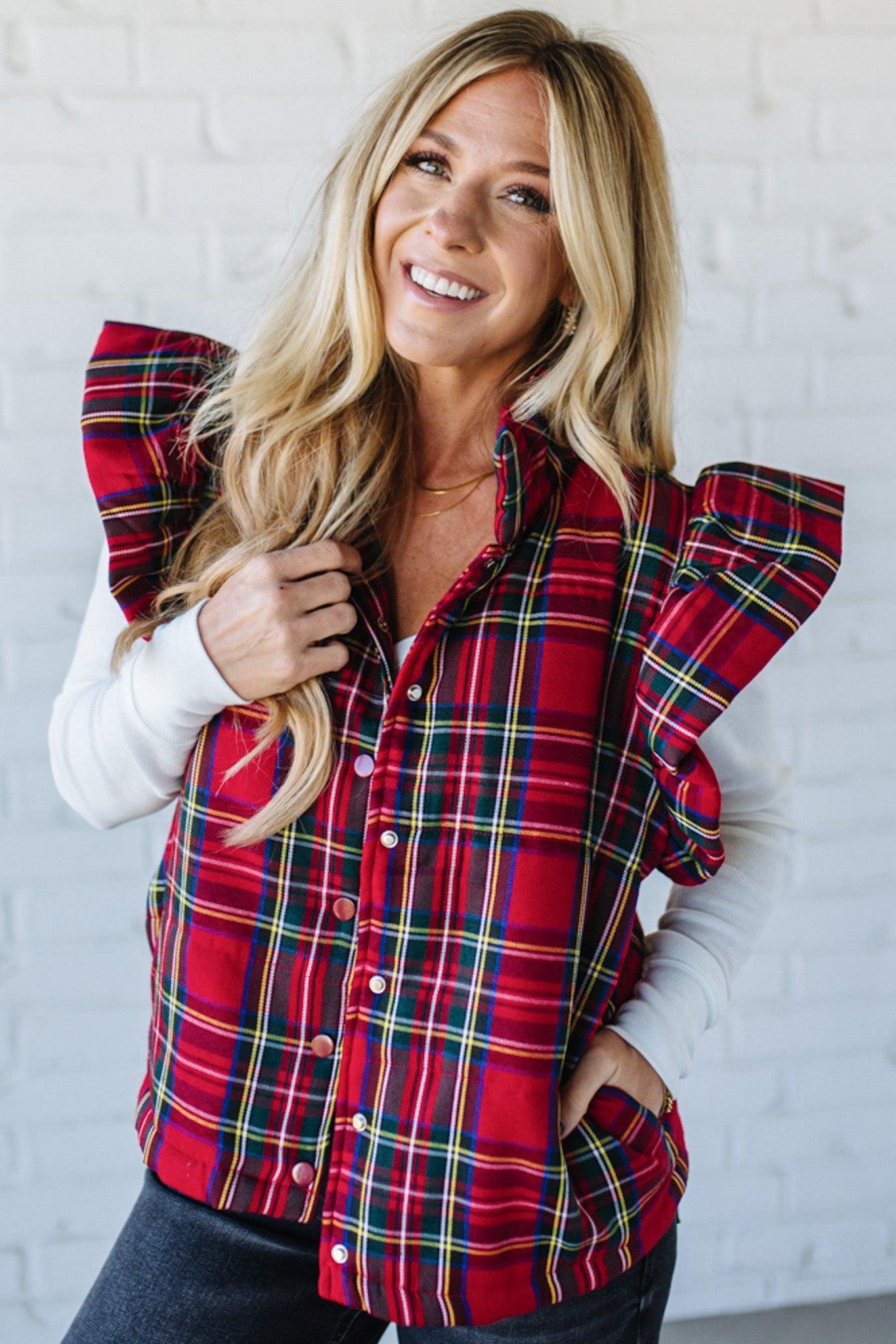 Blonde Woman Wearing a Red Christmas Plaid Ruffled Puffer Vest.