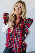Blonde Woman Wearing a Red Christmas Plaid Ruffled Puffer Vest.