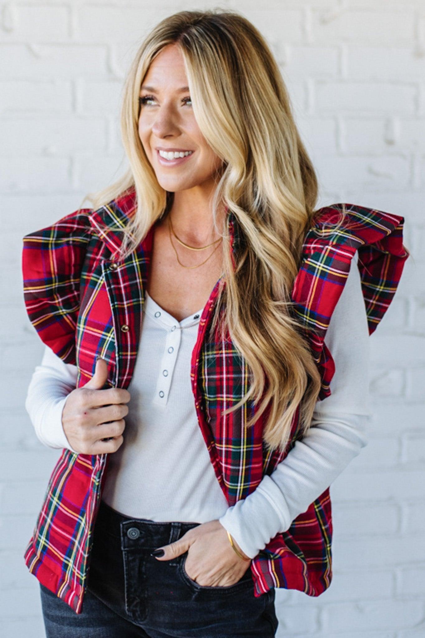 Blonde Woman Wearing a Red Christmas Plaid Ruffled Puffer Vest.