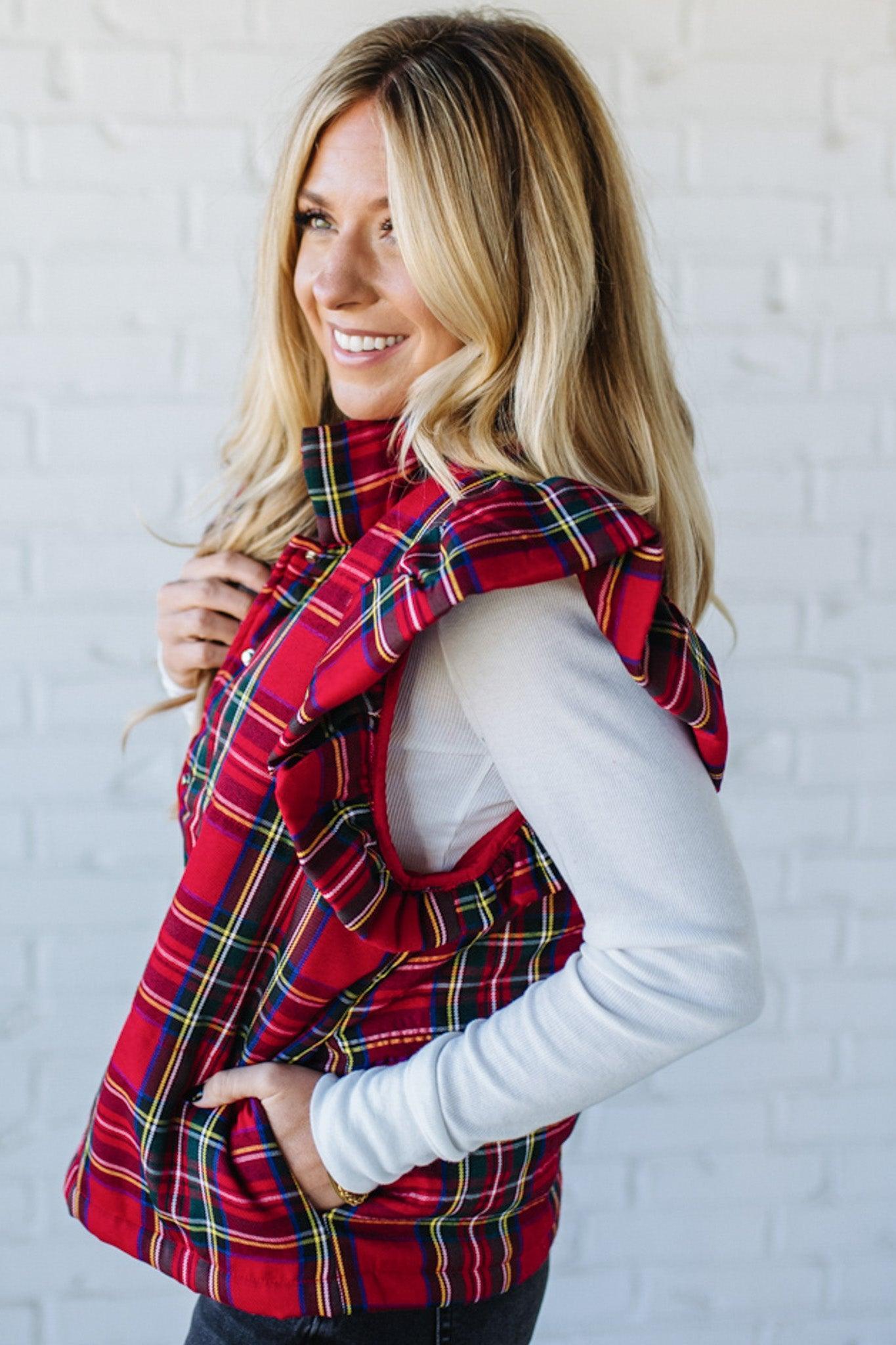 Blonde Woman Wearing a Red Christmas Plaid Ruffled Puffer Vest.