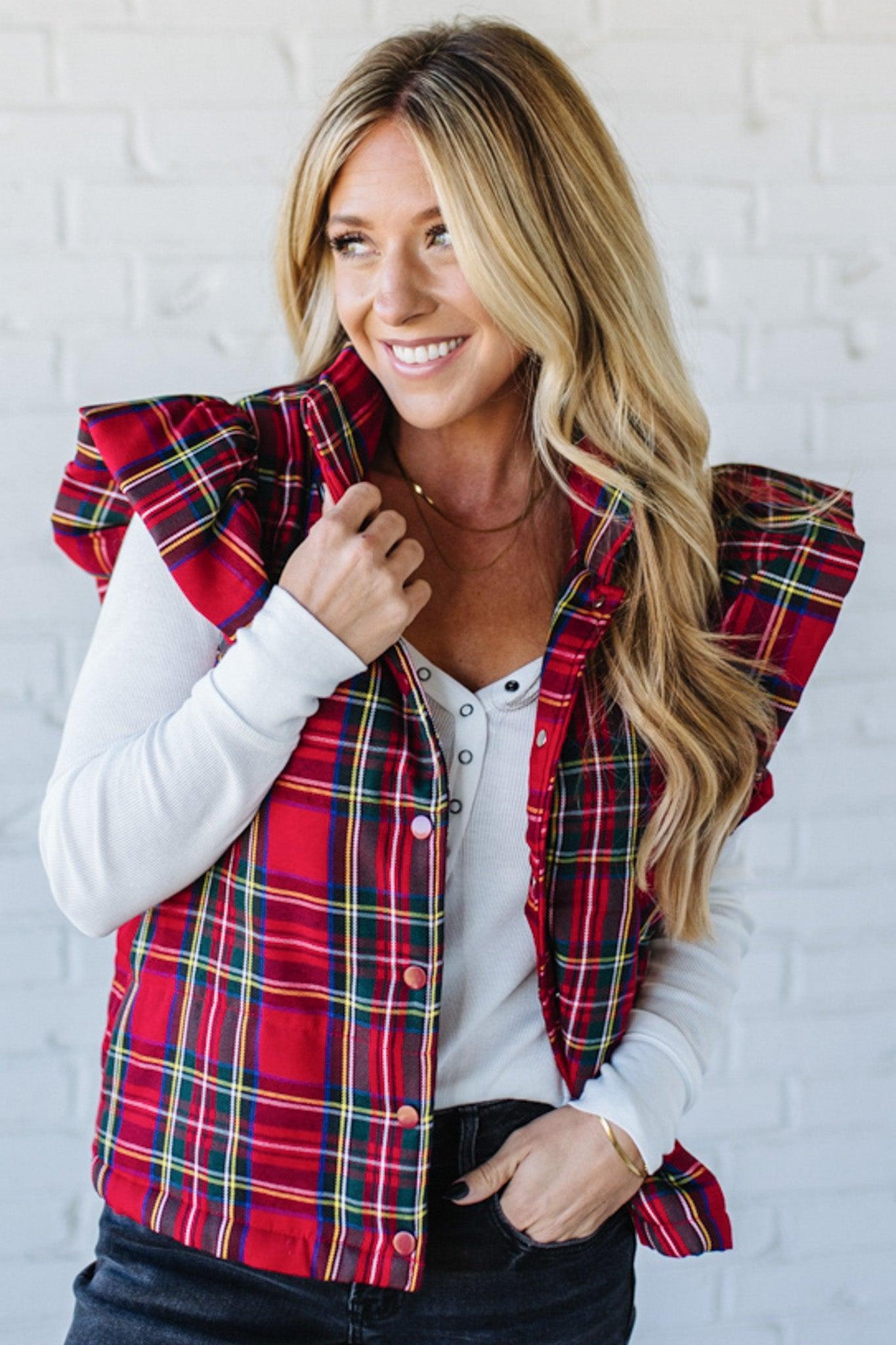 Blonde Woman Wearing a Red Christmas Plaid Ruffled Puffer Vest.
