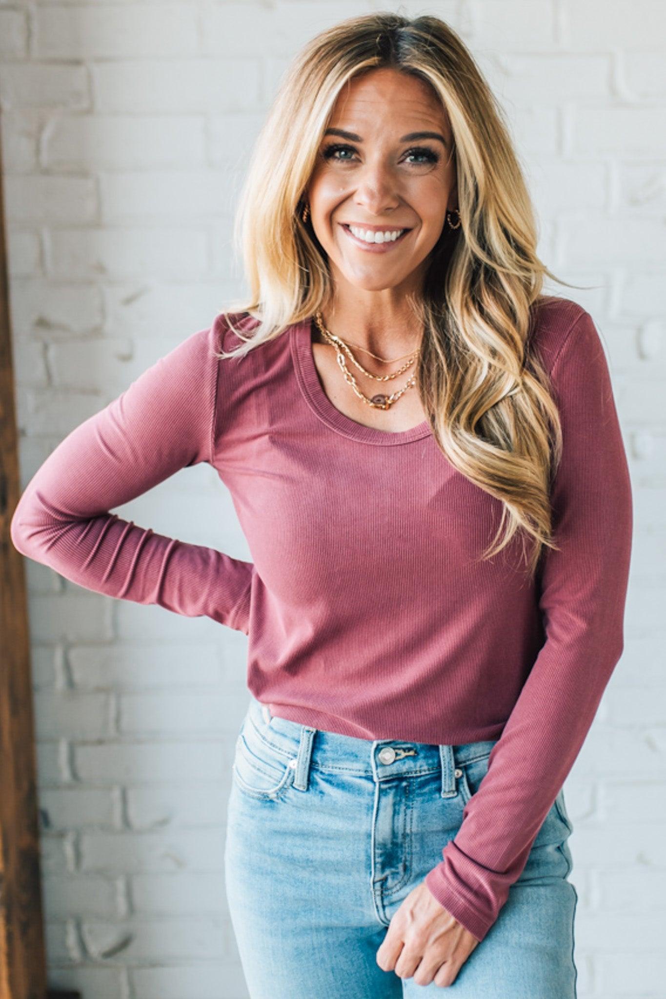 Blonde Woman Wearing A Solid Washed Basic Scoop Neck Ribbed Tee.
