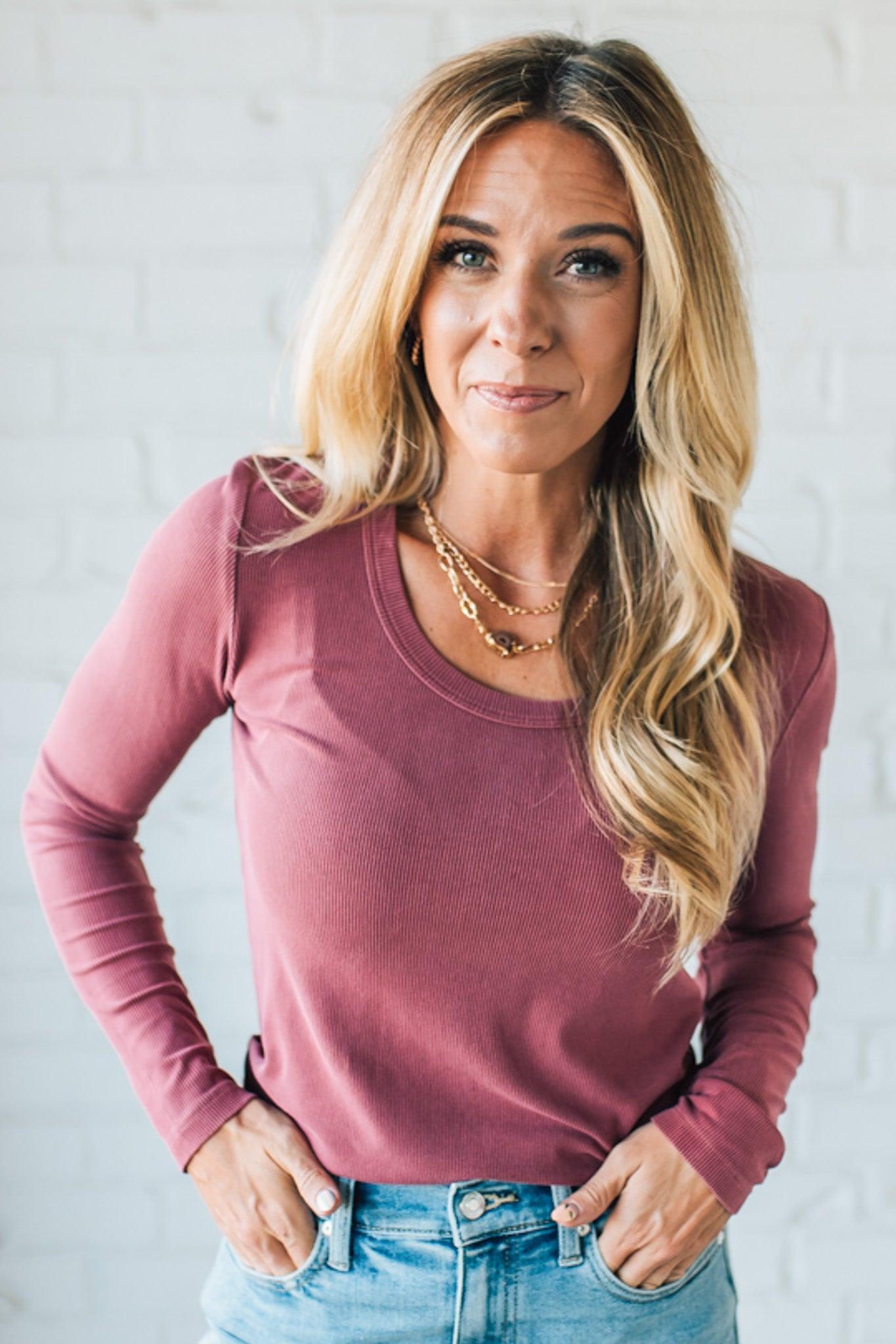 Blonde Woman Wearing A Solid Washed Basic Scoop Neck Ribbed Tee.