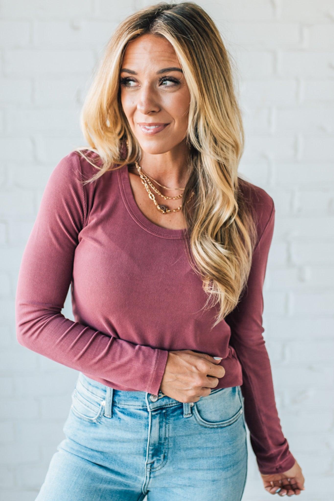 Blonde Woman Wearing A Solid Washed Basic Scoop Neck Ribbed Tee.