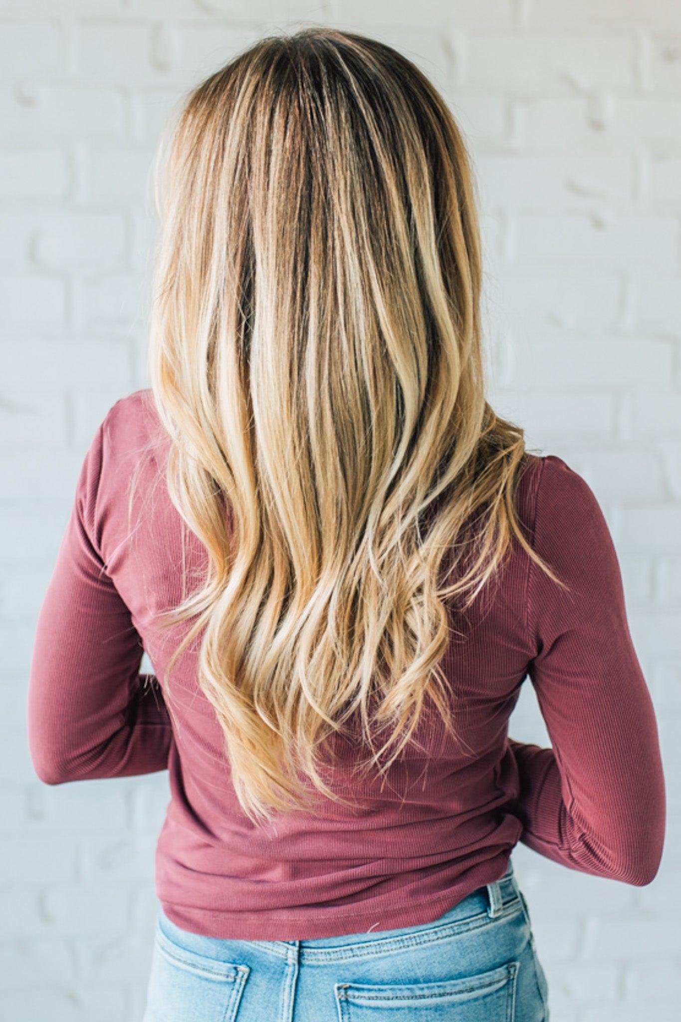 Blonde Woman Wearing A Solid Washed Basic Scoop Neck Ribbed Tee.