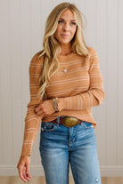 BLONDE WOMAN IN A STUDIO WEARING JEANS AND A BIG BELT WITH A CAMEL RIBBED, LONG SLEEVE, CREW NECK, SUPER STRETCHY BASIC STRIPED INNER SWEATER.