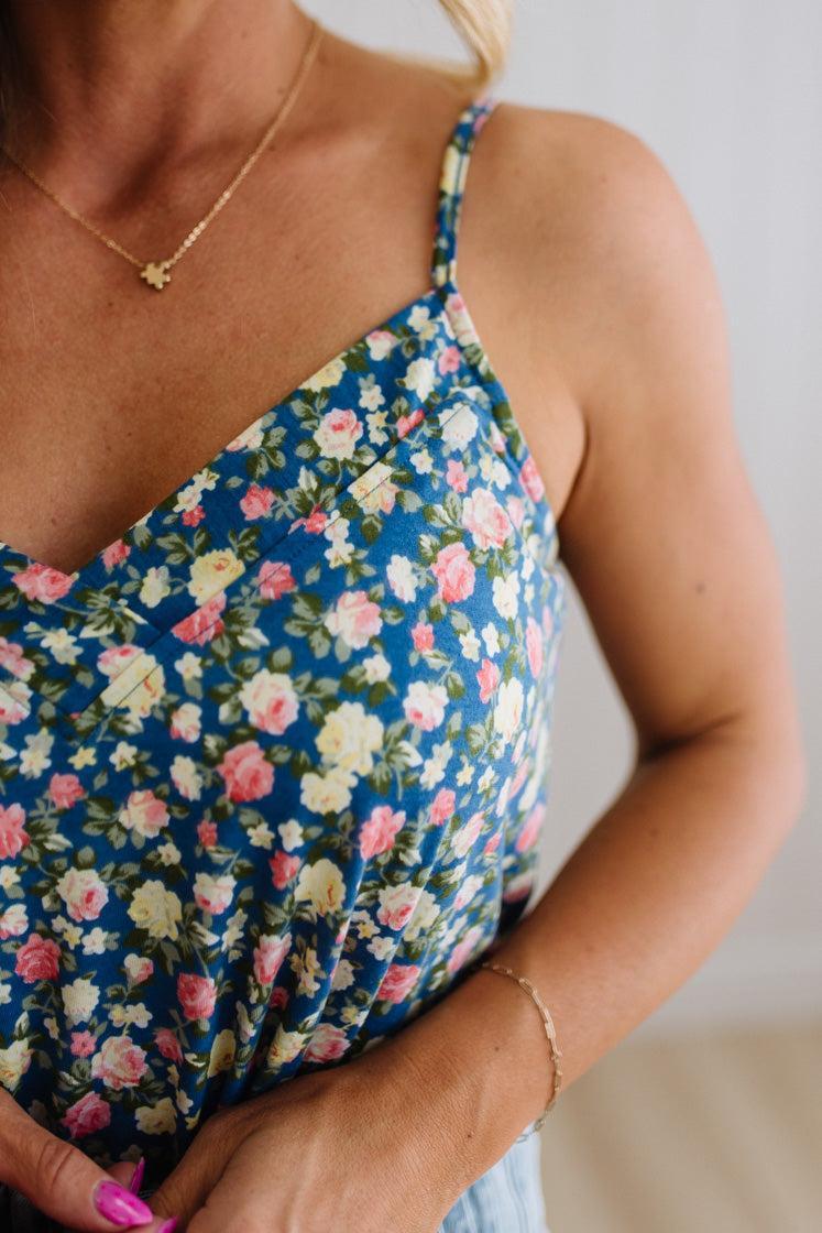 Blonde Woman Wearing a V Neck Floral Printed Tank Top.