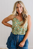 Blonde Woman Wearing a V Neck Floral Printed Tank Top.