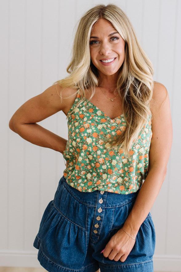 Blonde Woman Wearing a V Neck Floral Printed Tank Top.