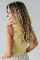 Blonde Woman Wearing a Solid Basic Cotton Garment Dyed Round Neck Tank Top.