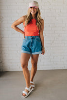 Blonde Woman Wearing a Solid Basic Cotton Garment Dyed Round Neck Tank Top.