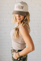 Blonde Woman Wearing a Solid Basic Cotton Garment Dyed Round Neck Tank Top.