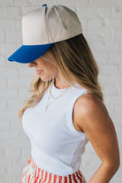 Blonde Woman Wearing a Solid Basic Cotton Garment Dyed Round Neck Tank Top.