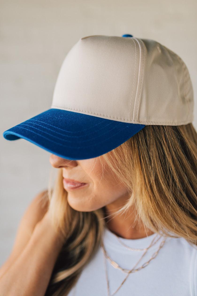 Blonde Woman Wearing a Two Tone Canvas Trucker Hat Baseball Cap.