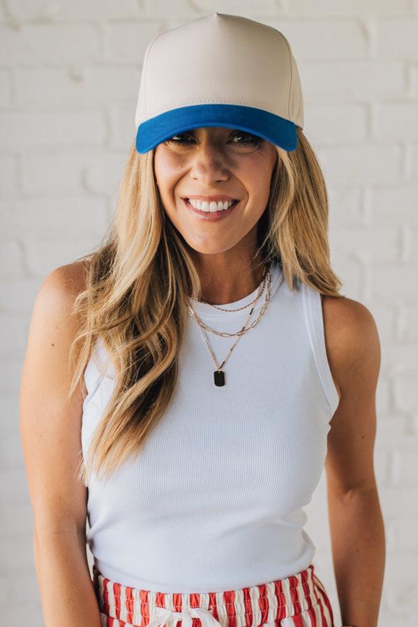 Blonde Woman Wearing a Two Tone Canvas Trucker Hat Baseball Cap.