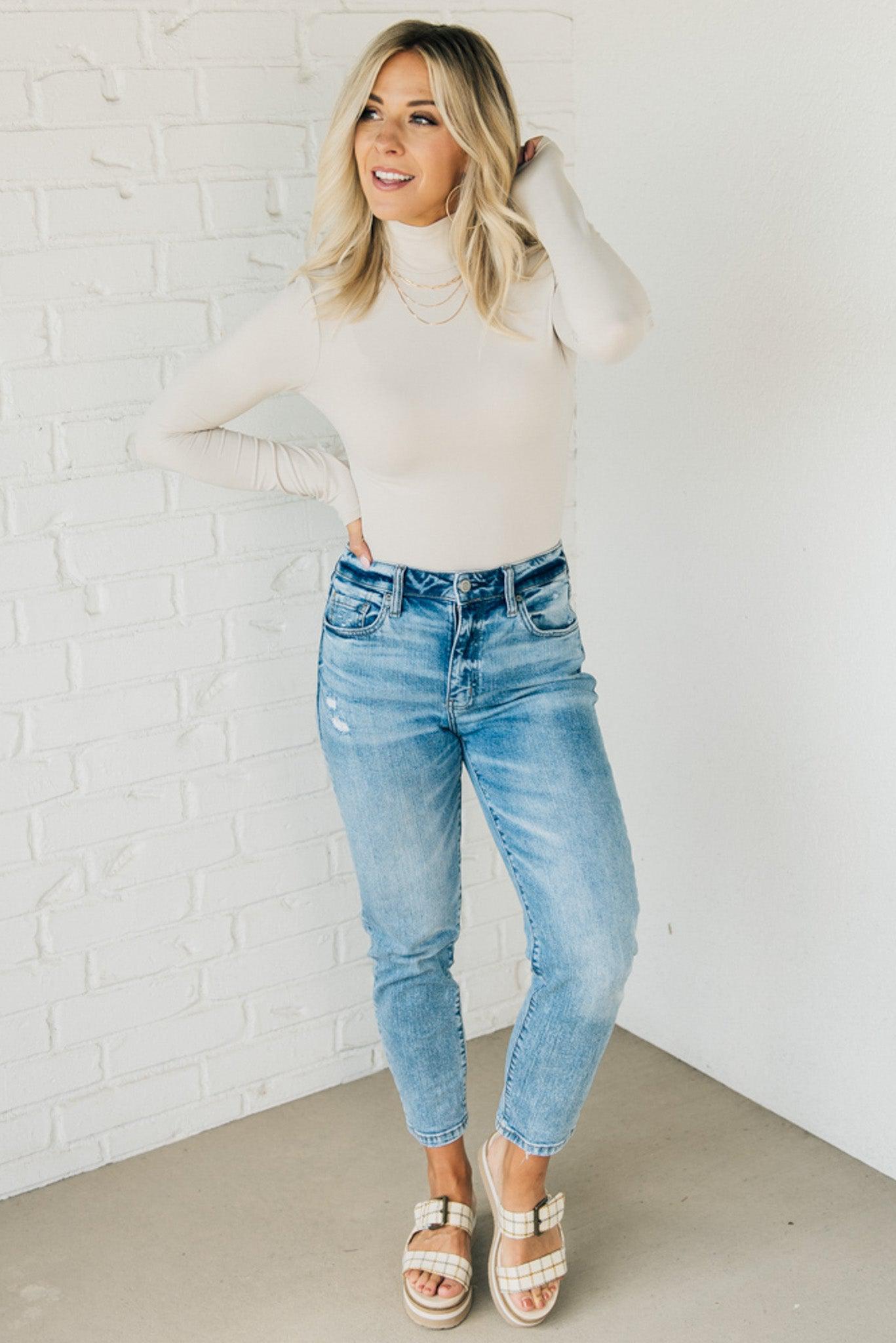 Outfit With Holiday Joy: Ivory Bodysuit + Flare Jeans - The Mom Edit