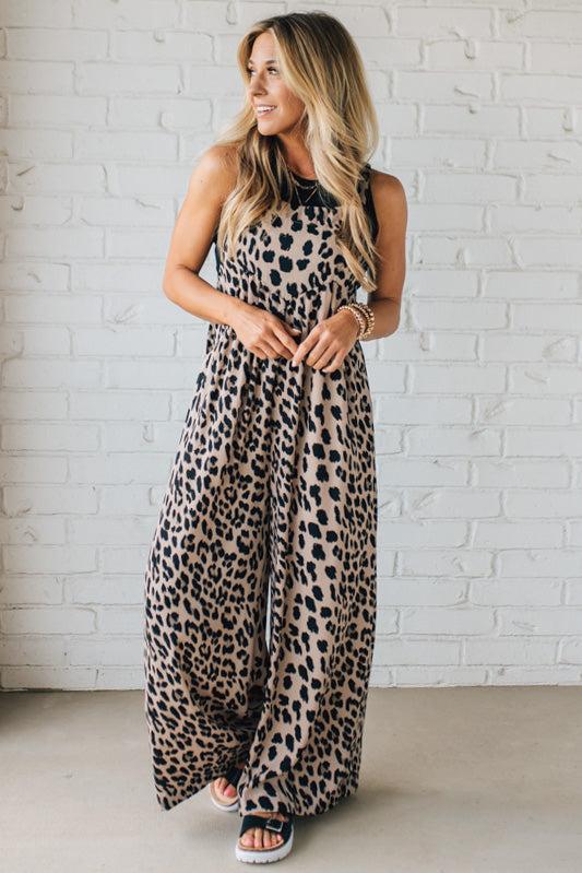Blonde Woman Wearing Bold Leopard Print Wide Leg Overalls with Side Pockets.