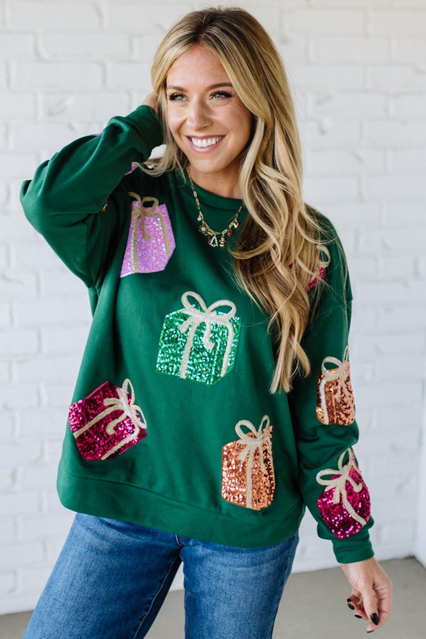 Blonde Woman Wearing a Sequin Christmas Gift Box Embroidered Pullover