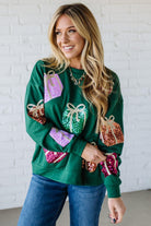 Blonde Woman Wearing a Sequin Christmas Gift Box Embroidered Pullover