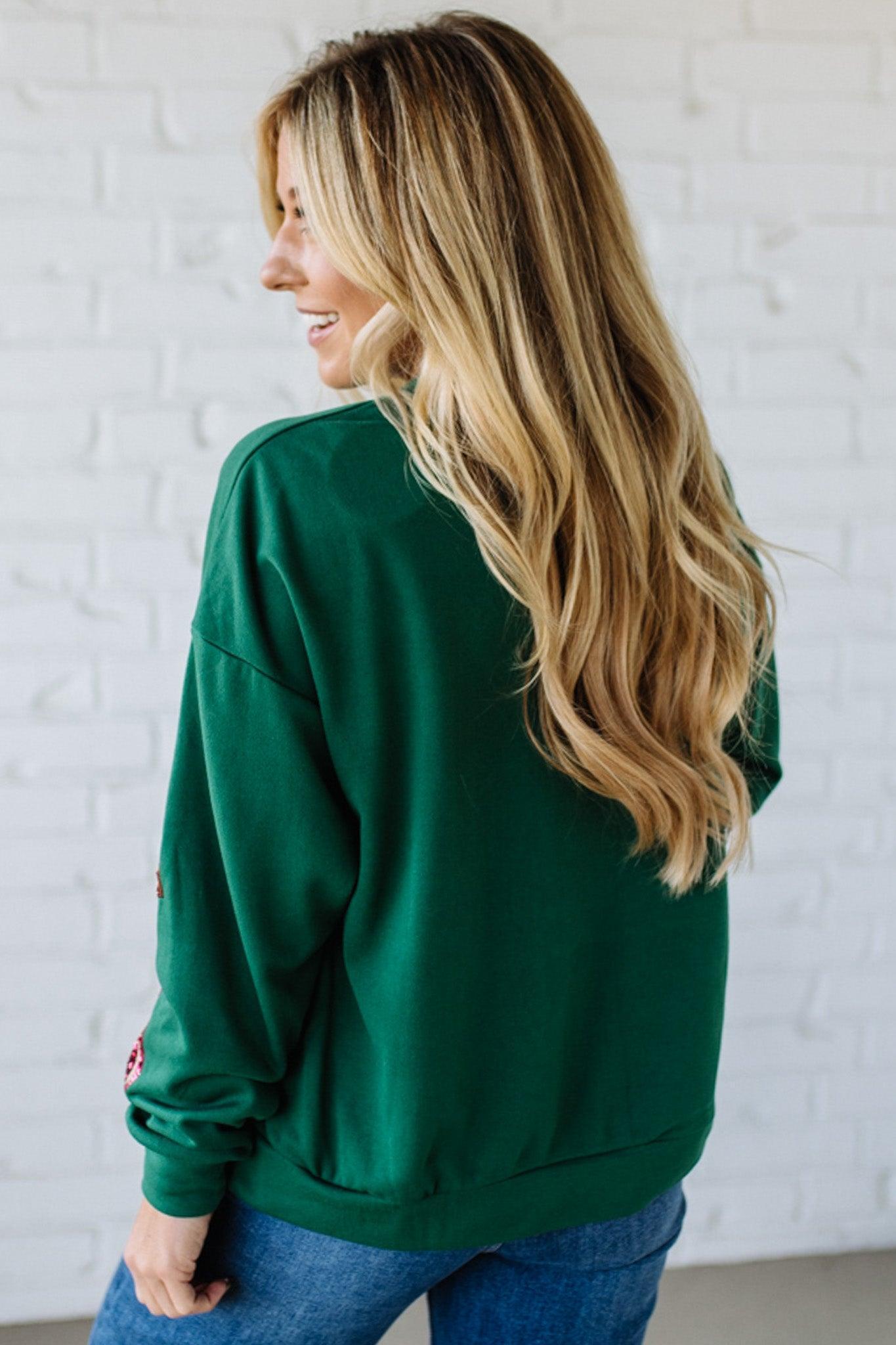 Blonde Woman Wearing a Sequin Christmas Gift Box Embroidered Pullover