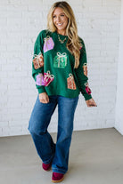 Blonde Woman Wearing a Sequin Christmas Gift Box Embroidered Pullover