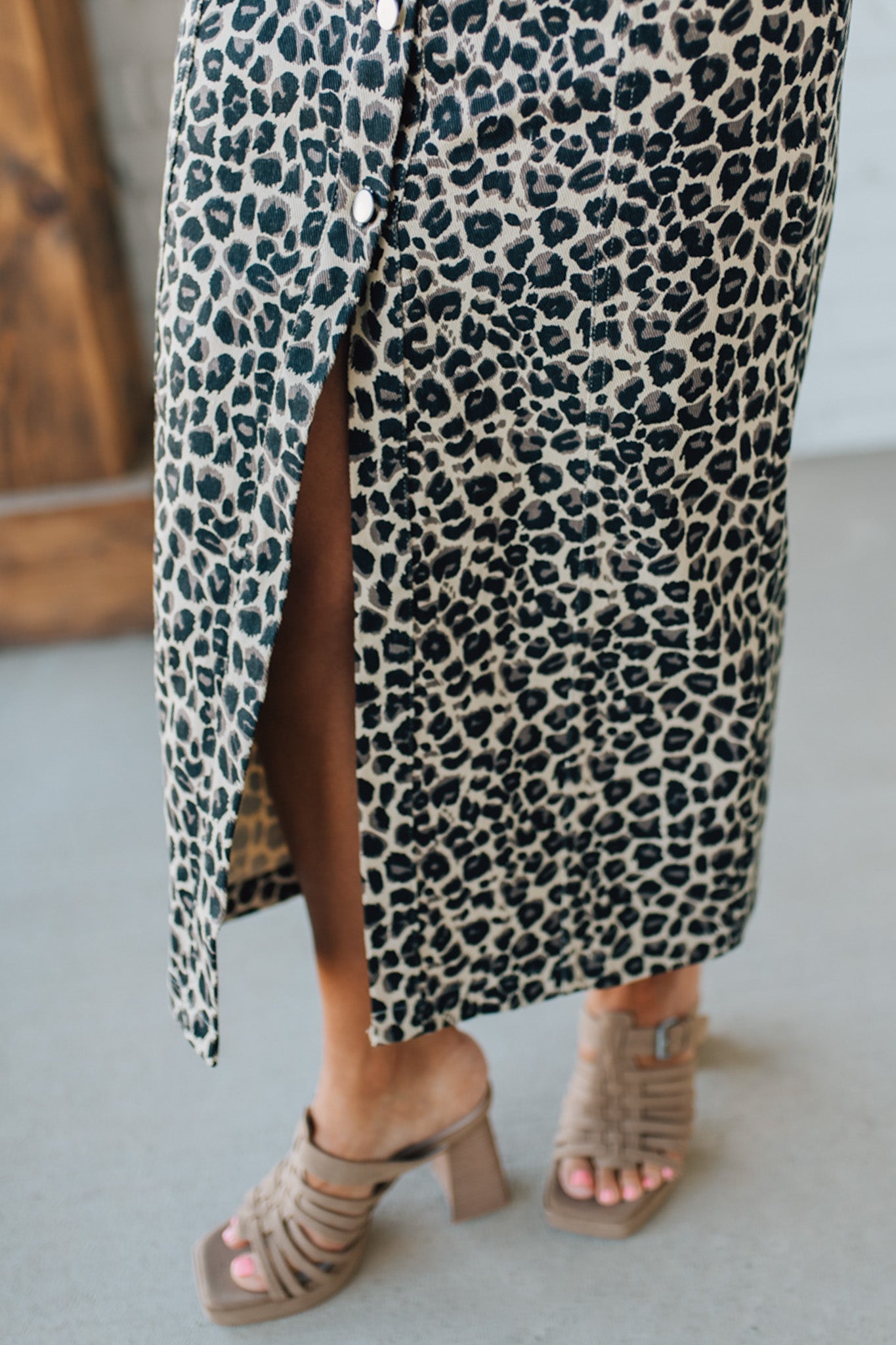Blonde Woman Wearing a Button Front Maxi Leopard Denim Shirt Dress.