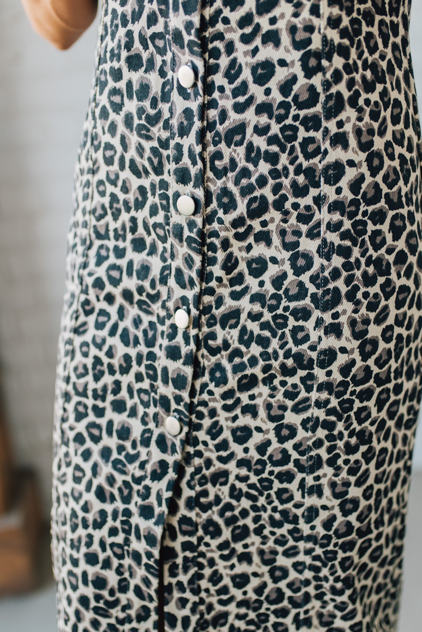 Blonde Woman Wearing a Button Front Maxi Leopard Denim Shirt Dress.
