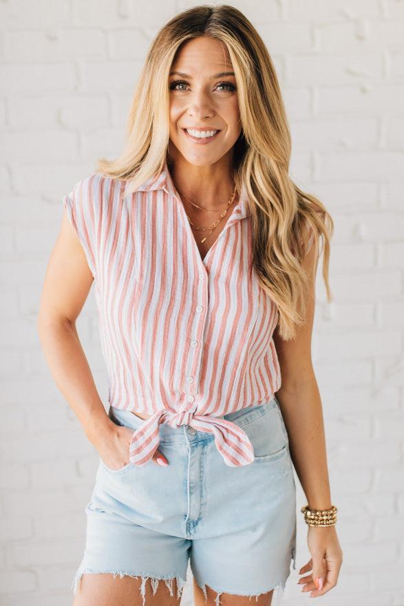 Blonde Woman Wearing a Button Front Faded Red and White Striped Cotton Gauze Front Tie Shirt.