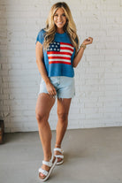 Blonde Woman Wearing a Cobalt Blue Mesh Weave American Flag Open Stitch Sweater Top.