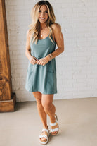 Blonde woman wearing a Mini Dress With Built-in Romper Liner.
