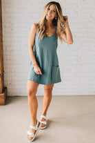 Blonde woman wearing a Mini Dress With Built-in Romper Liner.