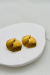 gold stud earings with an alternating swirl pattern