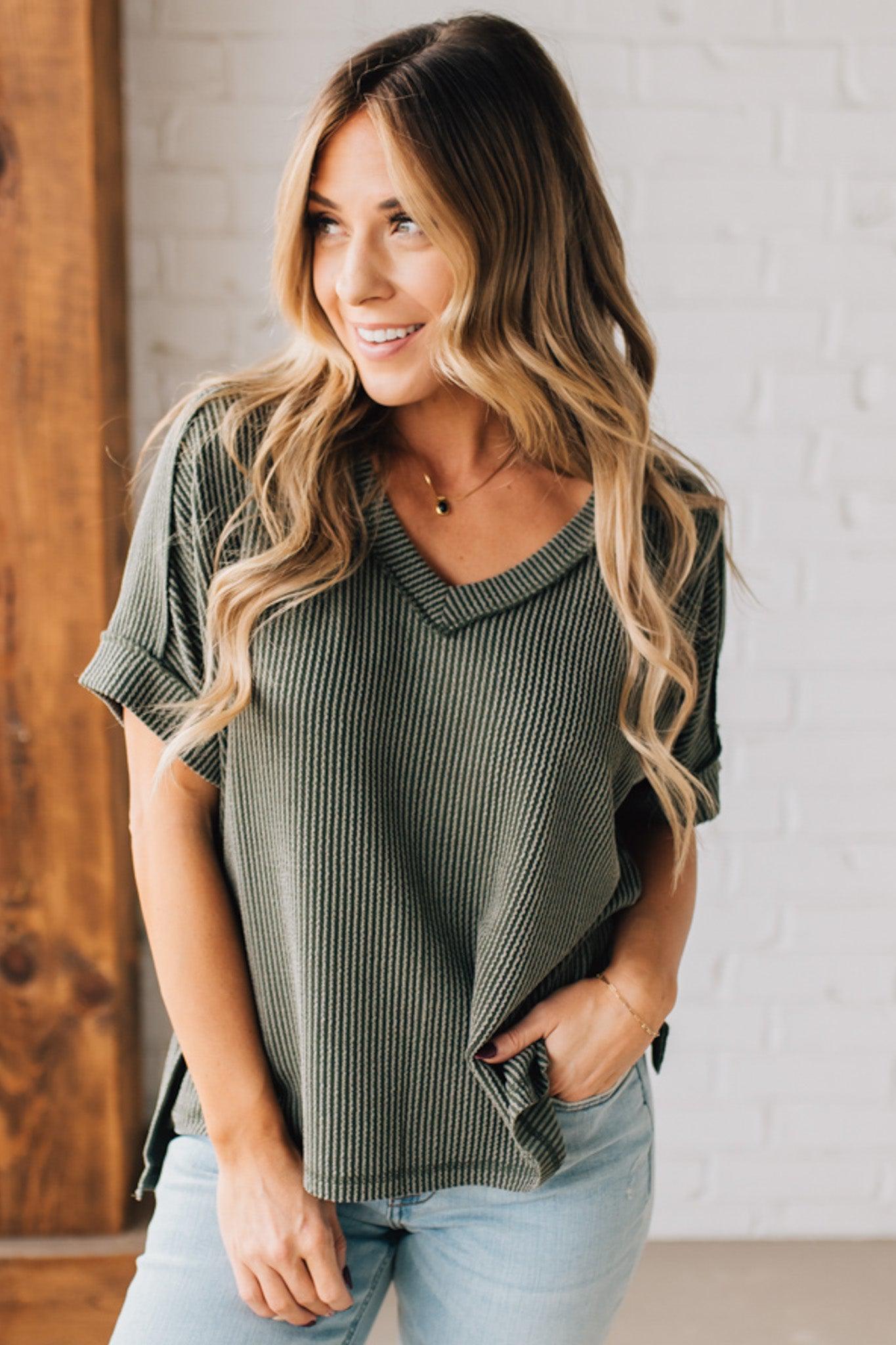 women modeling a olive short sleeve corded v neck top