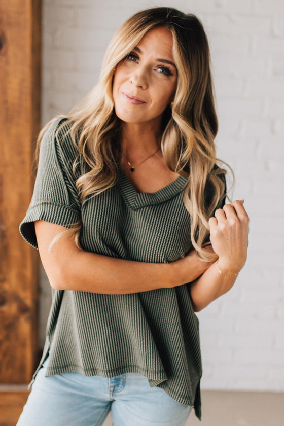 women modeling an olive short sleeve corded v neck top