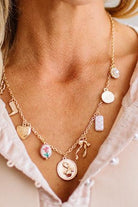 The gold-tone finish has real warmth to it, and because it's gold plated stainless steel, it holds up to everyday wear instead of hiding in a drawer for special occasions. The adjustable chain means you can drop it longer for layering or keep it closer to the collar.