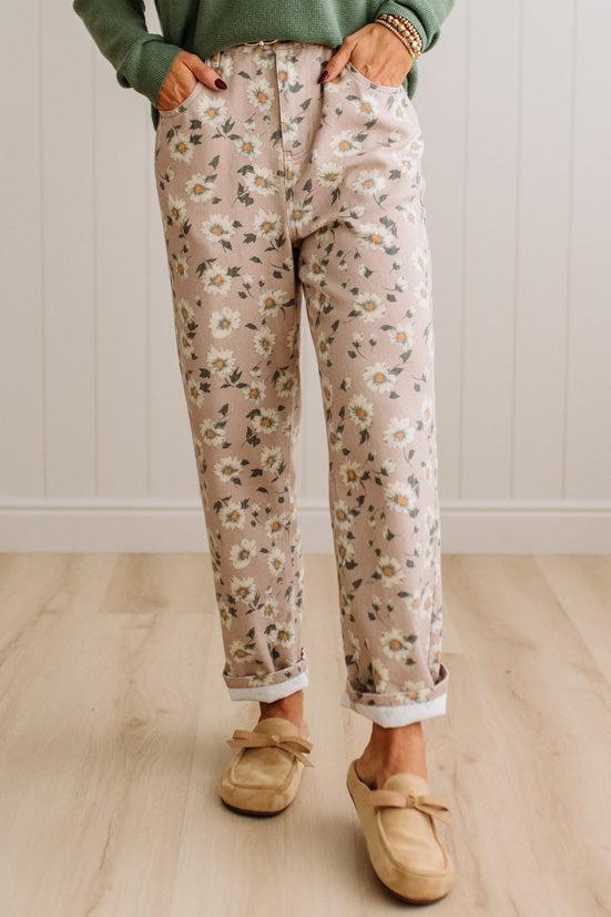 Woman Standing on Light Wood Floor with a Paneled Wall behind and wearing a green shirt, light tan slip on loafers and Delicate Wildflower Harmony Classic Fit Trouser Pants.