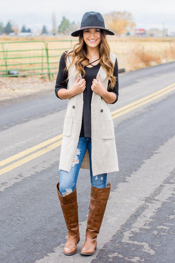 Long Sweater Vest | Oat
long-length-duster-sweater-vest-with-button-up-detail