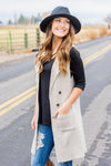 Long Sweater Vest | Oat
long-length-duster-sweater-vest-with-button-up-detail