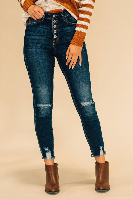 button front jeans with distressed details